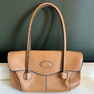 Tods mini leather bag. Short strap and gold hardware. Gently used.